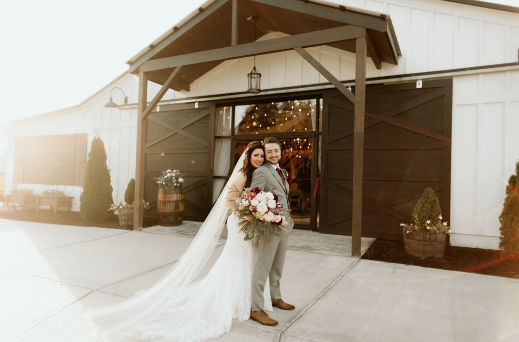 A couple Standing Outside of Lily Creek Farm