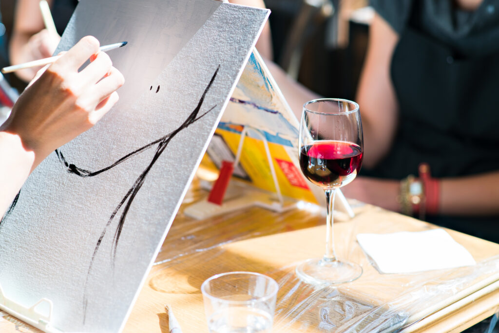 Drawing a glass of red wine on a table