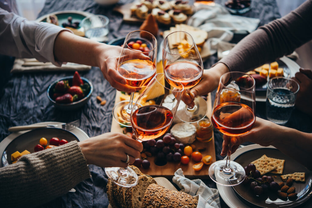 Glasses of rose wine seen during a friendly party of a celebration.